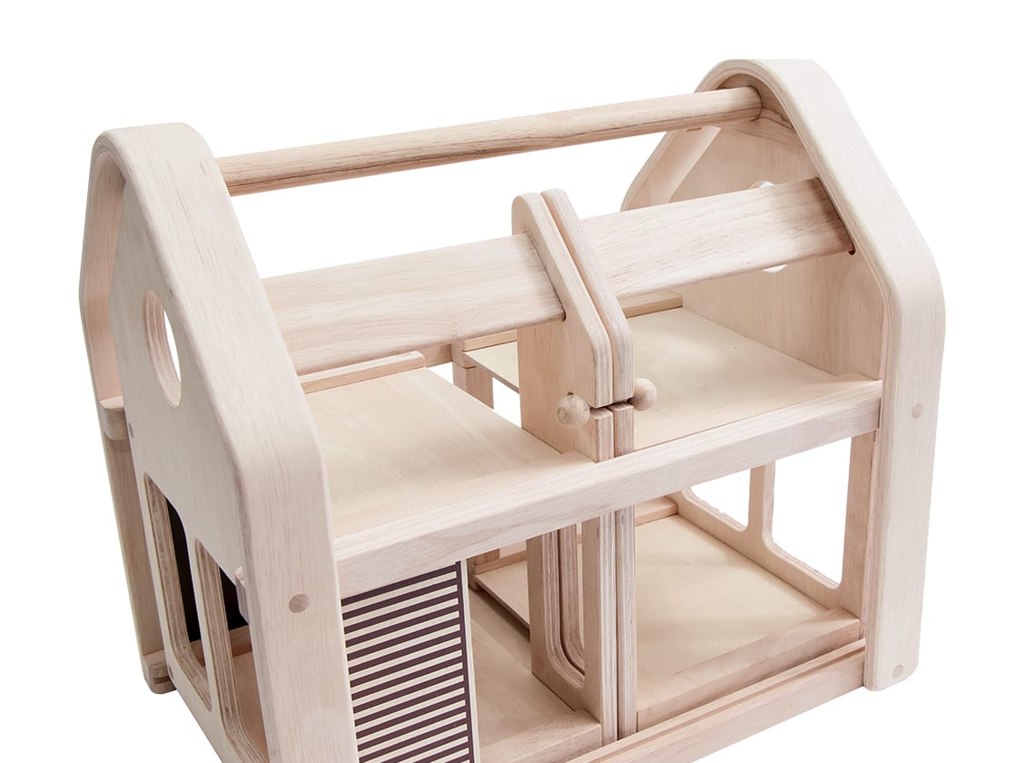 plan toys slide n go dollhouse